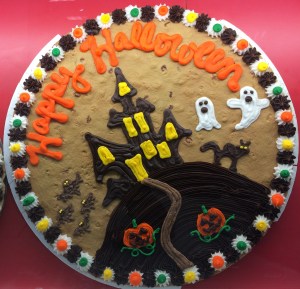 Custom Haunted House Halloween Cookie Cake. Call King Cookie Ocala today. 352-237-2557